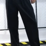 BLACK RELAXED FIT PLEATED TROUSERS